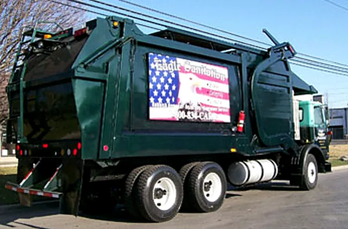 Rear three quarter view of an Eagle Sanitation truck
